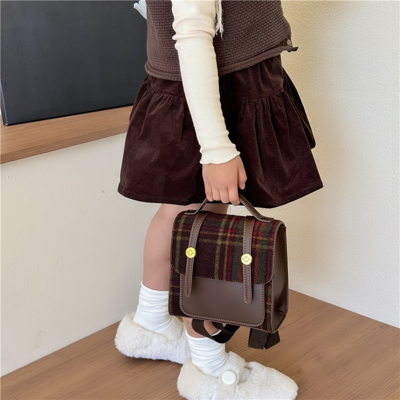 Mochila transfronteriza para niños nuevos europeos y americanos retro estilo británico para hombres y mujeres bolsa mini mochila portátil de jardín de infantes