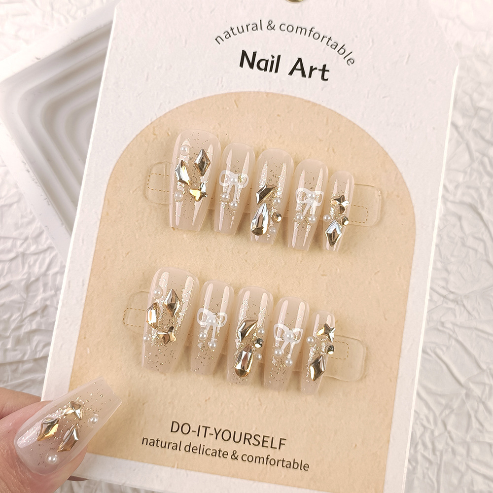 Manicura de Año Nuevo, 10 piezas de diamantes de perlas hechos a mano, arte de uñas portátil, parche de uñas Xiaohongshu, venta al por mayor