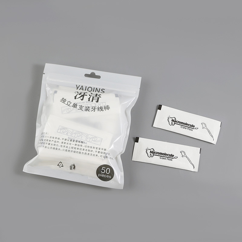 30/50/100 packs of bagged floss for teeth cleaning. Portable oral hygiene disposable toothpick in individual packaging.