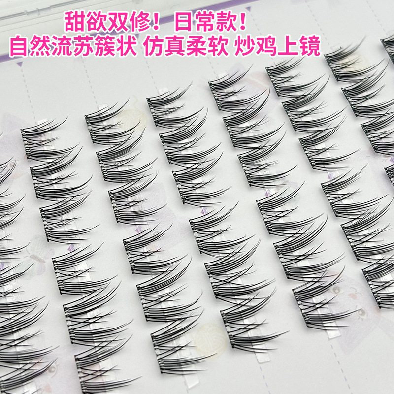 Venta al por mayor de 10 filas sin pegamento borlas orejas de gato pestañas postizas simulación natural Ma Sheng pestañas segmentadas libro de pestañas perezosas de un solo grupo