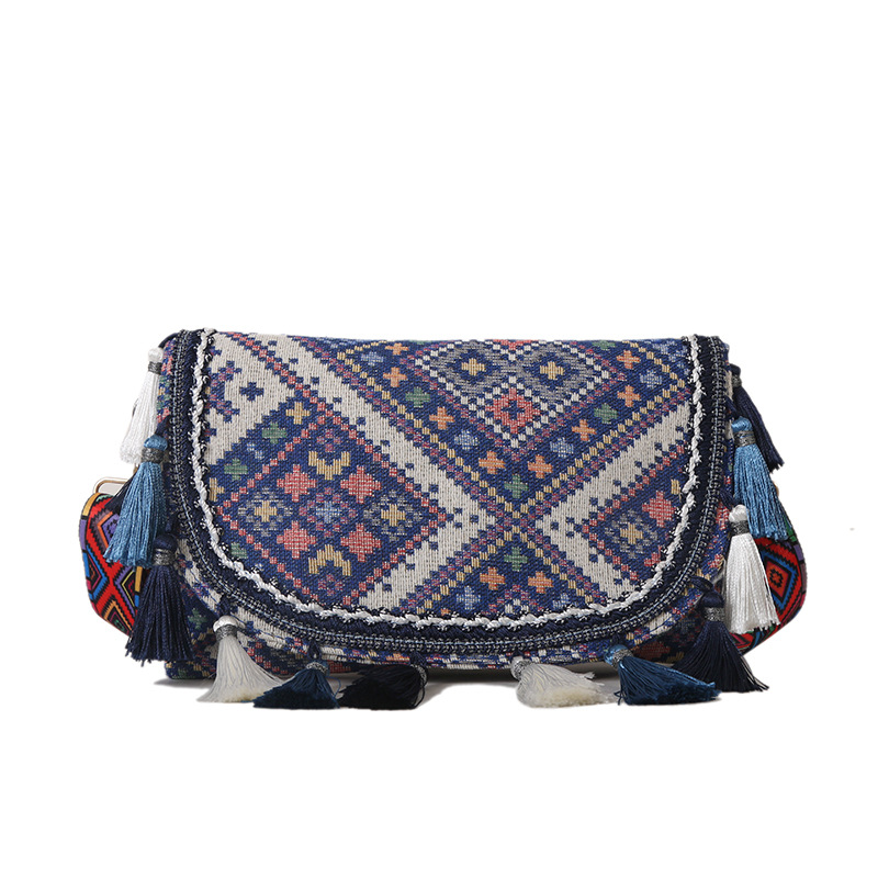 Nueva moda estilo étnico estudiante bolso de gran capacidad bolso de mano de las mujeres de estilo occidental borla bolso de hombro de las mujeres al por mayor