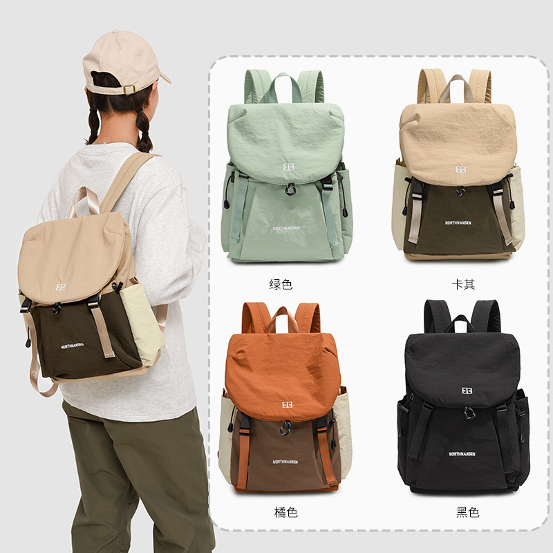 Mochila de viaje transfronteriza nueva mochila femenina de gran capacidad moda ligera impermeable salida simple bolso de ocio de viaje