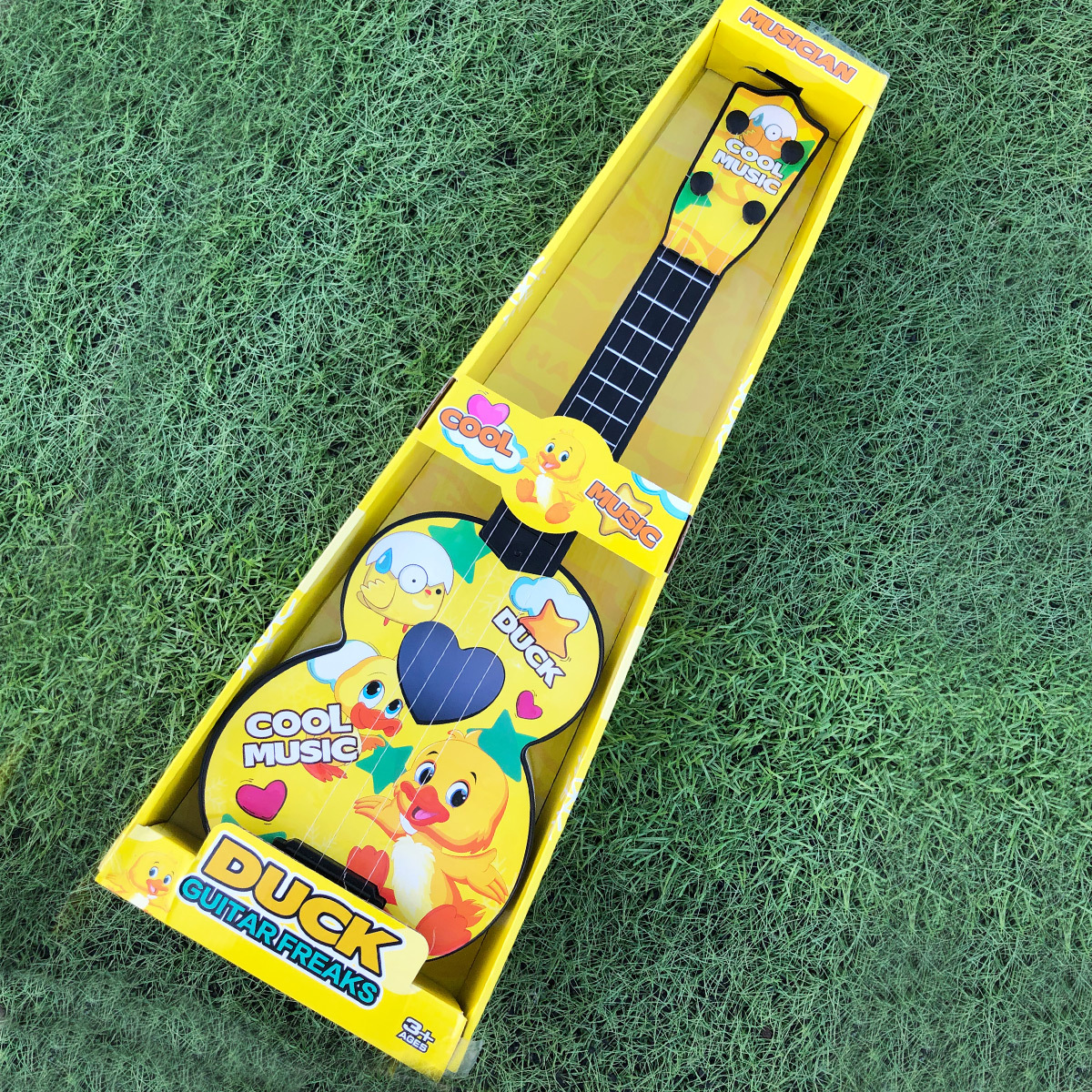 Instrumento Musical DE LOS NIÑOS 61cm gran caja de regalo ukulele guitarra versión piel pequeño pato lindo Institución Educativa regalo