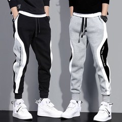シャツの少ない服装のカジュアルなズボンの男性の秋冬の新型の大きいサイズはゆったりしています。