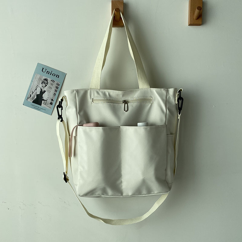 Bolsa de lona impermeable bolsa de hombro de verano para mujer bolsa de gran capacidad para mujer bolsa de mensajero para estudiantes universitarios