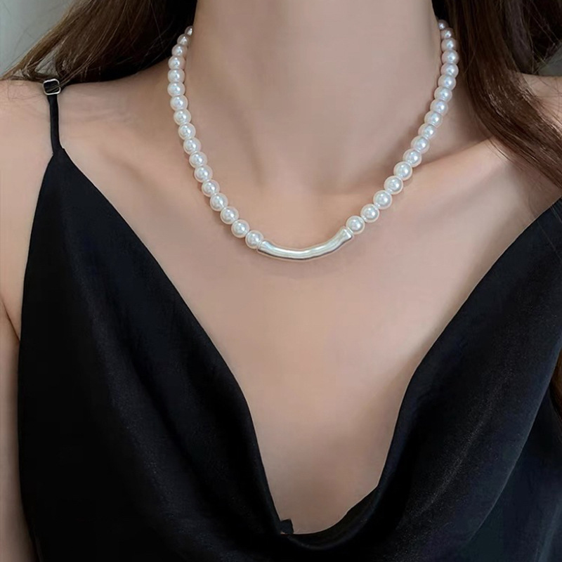 Collar de perlas con lazo de súper hada, cadena de clavícula de moda de lujo ligero francés, sentido de alta gama, joyería de nicho de arte, mujer al por mayor