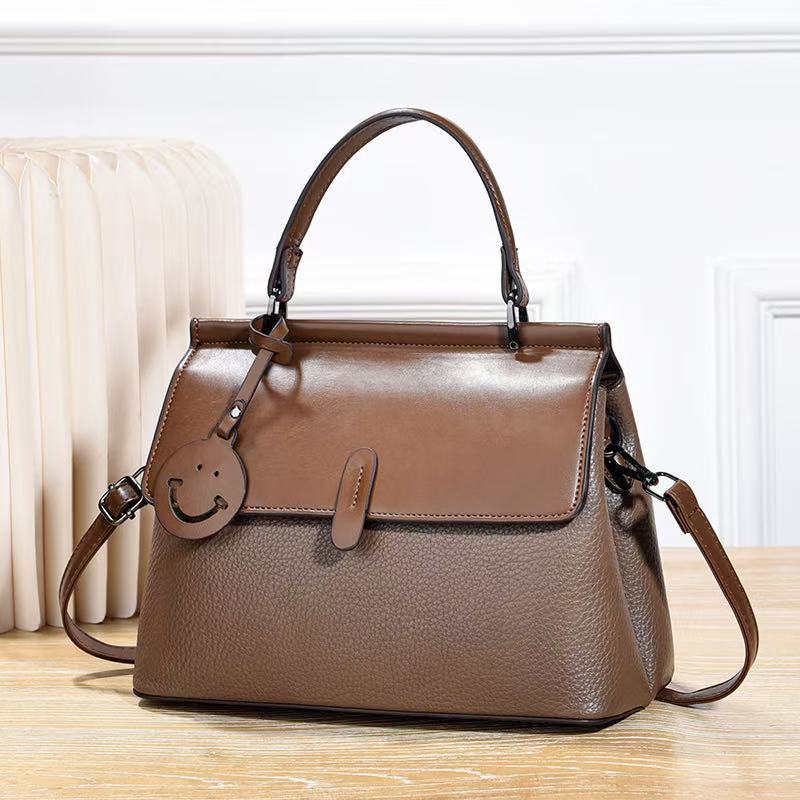 Bolso de hombro simple bolso de color sólido bolso de mano adorable bolso de mochila bolso al por mayor transfronterizo bolsos de mujer pu
