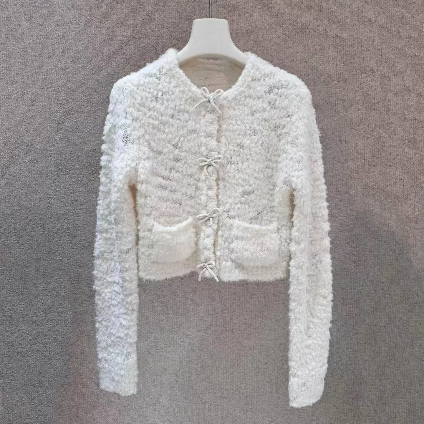 Shenzhen Nanyou High-End Women's Clothing 2026 Autumn French Style Granular Velvet Bow Knit Cardigan Coat for Women