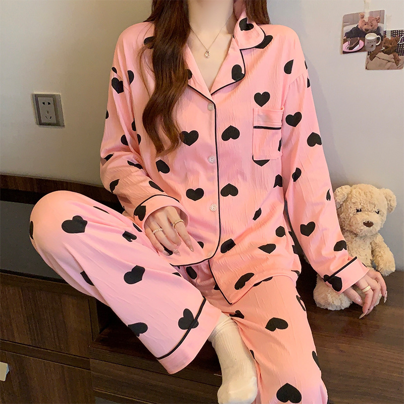蝶結びのさくらんぼのプリントの女性のパジャマの春と秋の新型のカーディガンの長袖のズボンの部屋の服のスーツは実際に卸売りをたたきます。|undefined