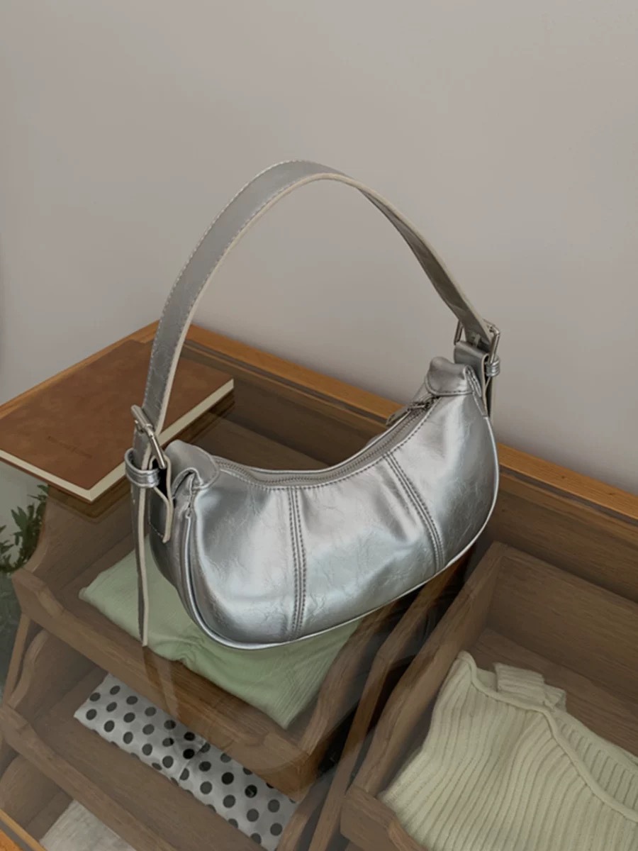 Borsa da ascella di design coreano di nicchia per donna, nuovo modello autunno 2025, borsa a mezzaluna argentata di alta gamma, borsa a tracolla e a spalla_voghion.com