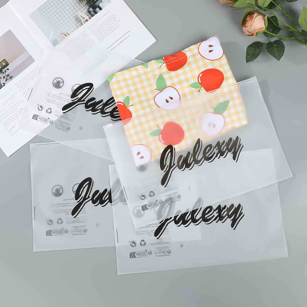 Bolsa con cremallera de ropa Bolsa con cremallera de crisantemo pequeño Bolsa de embalaje de camiseta Bolsa de ropa interior Bolsa de ropa PE esmerilada pequeña bolsa ziplock