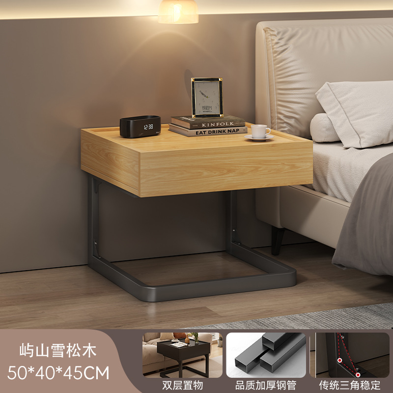 Mesa de cabecera lujosa alta sensación de hotel gabinete de almacenamiento pequeño sentido de diseño creativo de nicho estante alternativa artefacto