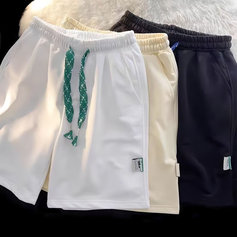 Pantalones cortos deportivos para hombres y mujeres de verano 2022 nuevos pantalones de longitud media estilo coreano negro pantalones cortos de pierna ancha rectos sueltos Casuales