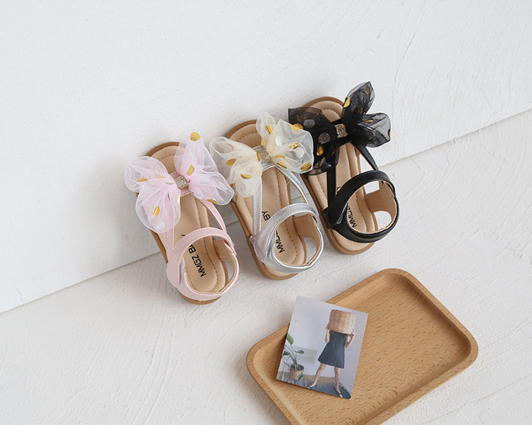 Versione coreana di fiori dolci da bambina con grande fiocco, scarpe per bambini, sandali per le vacanze al mare, estate 2021_voghion.com
