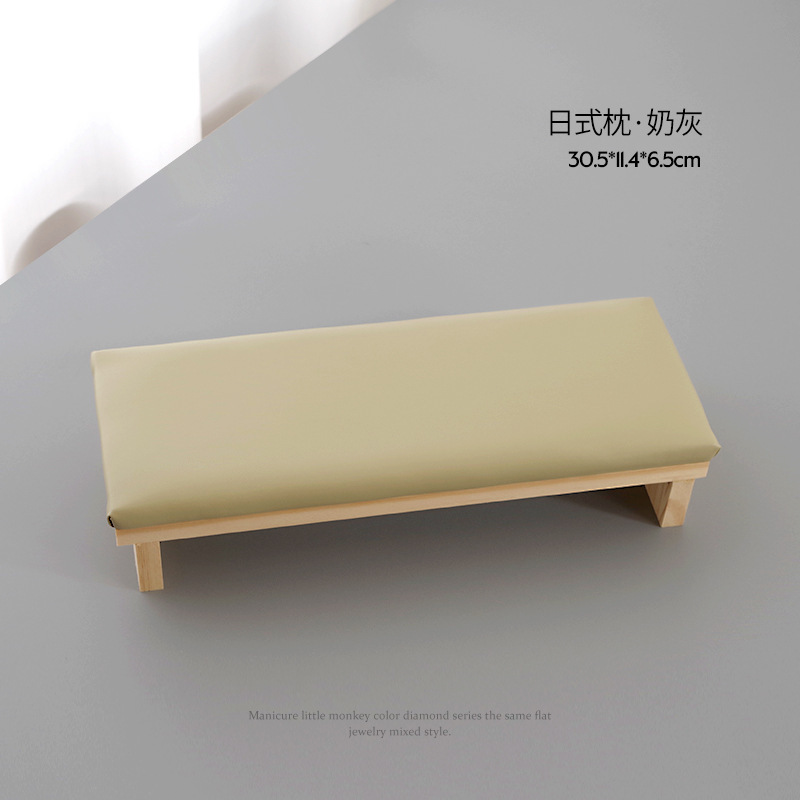 Herramienta de almohada de mano de manicura de estilo japonés registro estera de estilo simple máquina de fototerapia de Internet celebridad madera maciza estera de mesa de lujo ligero