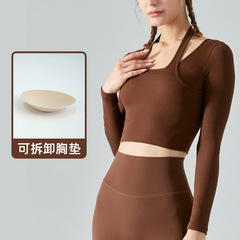 A two-piece long-sleeved women's yoga top with a detachable bralette for autumn, suitable for women's fitness clothing with a slimming design.