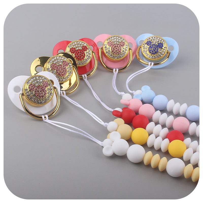Amazon nuevo bebé suministros creativo silicona chupete cadena bebé brillante diamante Mickey forma chupete traje