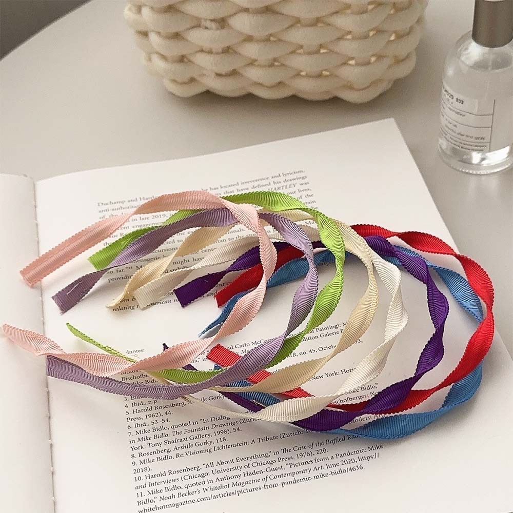 Diadema en espiral de color dopamina de primavera y verano para mujer 2025 nuevo estilo de salida de borde fino Diadema de sentido avanzado horquilla tocado