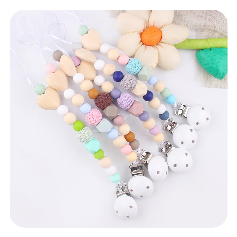 Productos para bebés y niños pequeños grano madera amor DIY tetina cadena calmar bebés perlas de silicona mordida goma molar cadena de prevención