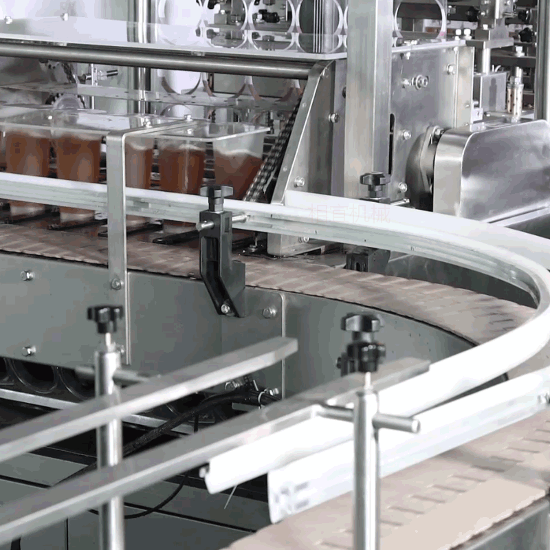 上海相宜机械全自动高速果汁茶、八宝粥直线型灌自立袋旋盖灌装机