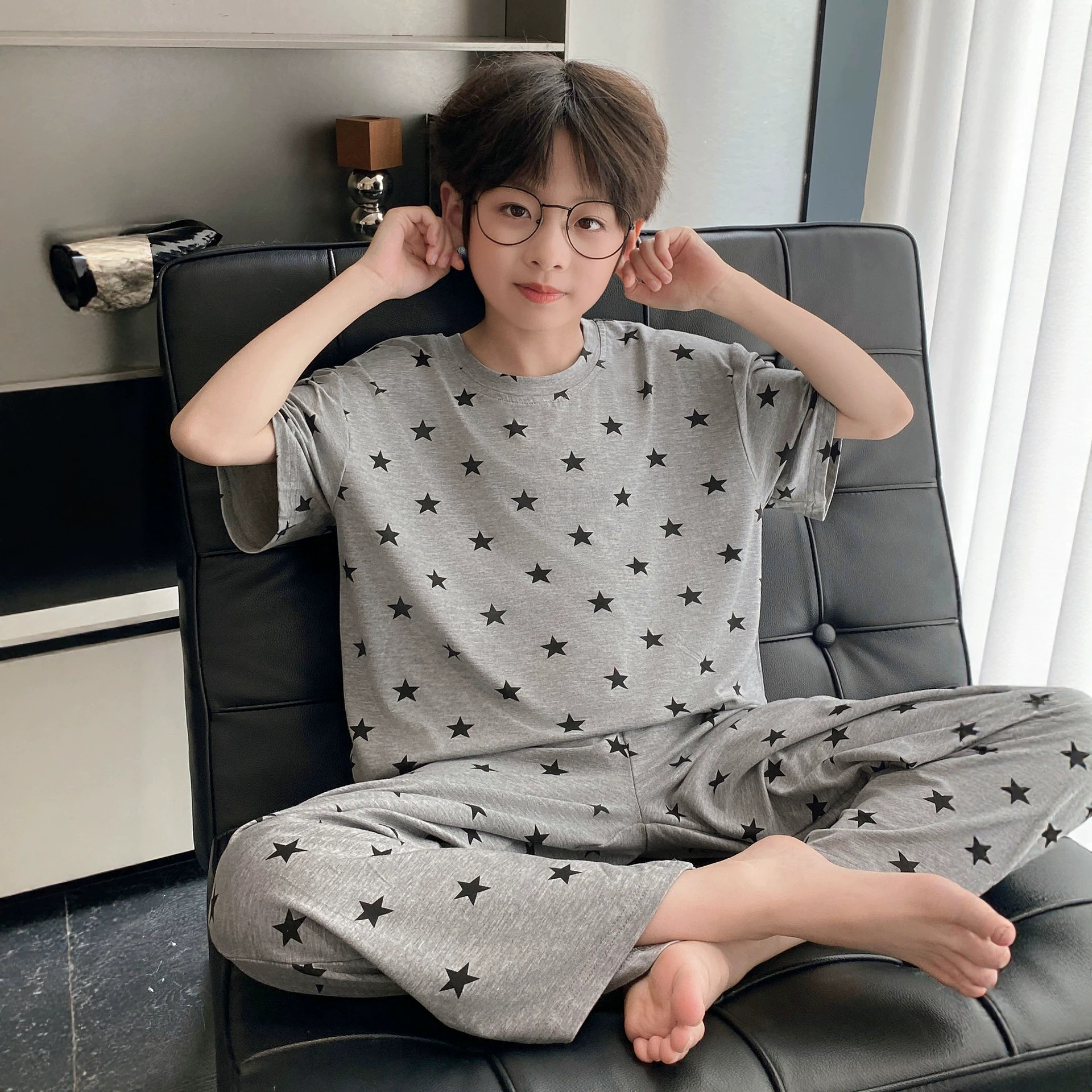 Stylish and high-quality summer modal ultra-thin short-sleeved summer children's pajamas for boys and teenagers, suitable for air conditioning.