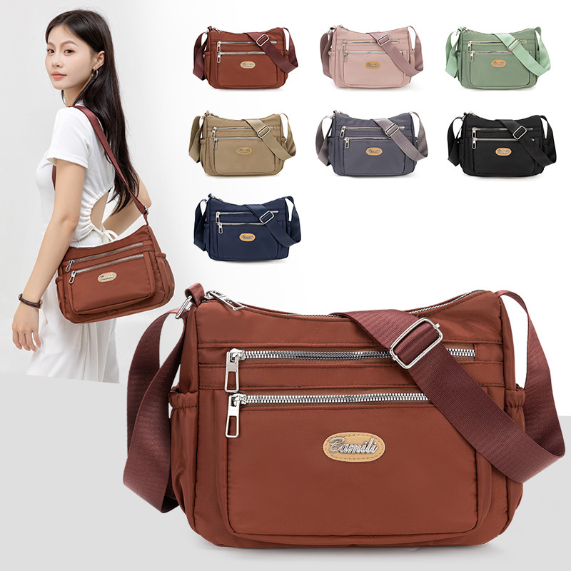 Bolso explosivo, tela de nailon para mujer, bolso de mensajero casual de gran capacidad, bolso de hombro ligero simple para madre de mediana edad para mujer