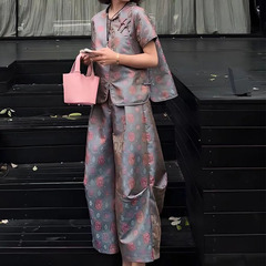 2025年新作夏の美しい服装、ゆったりとした新しい中国風のボタンプリントトップスとワイドレッグパンツのツーピーススーツ
