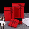 Handheld red gift box with bow, Birthday gift