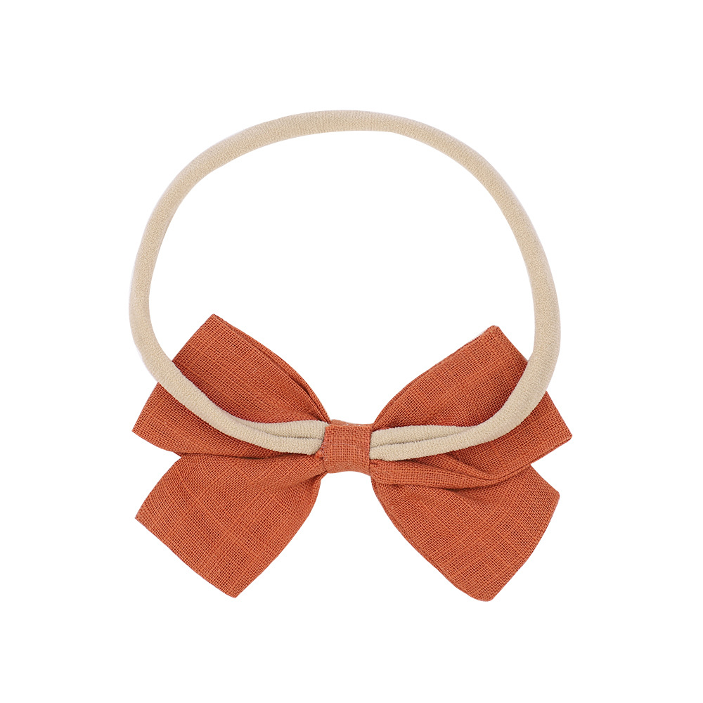 Nihaojewelry Cute Children's Cotton And Linen Fabric Bow Hair Band Wholesale Jewelry display picture 3