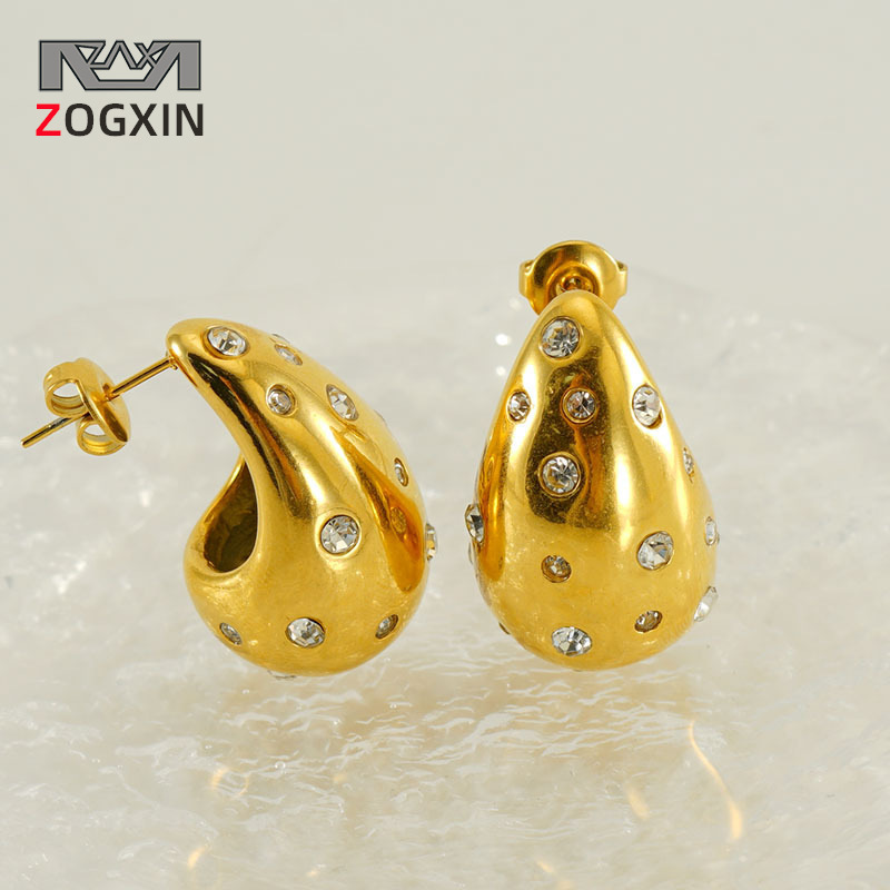 Diseño de alta gama sentido 18K oro gordito gota de agua pendientes de acero de titanio INS moda femenina todo partido pendientes geométricos al por mayor