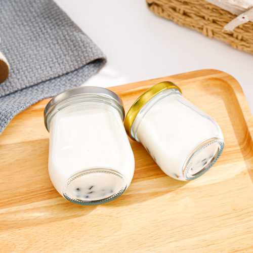 Manufacturer wholesale food glass bottles honey jars sealed canning jars with lids for chili sauce containers lemon paste transparent empty