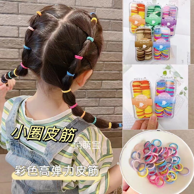 かわいい萌え赤ちゃんの子供のヘアリングの箱の中のひもの小さい皮の筋の高弾力の髪のひものかわいい女の子のカラーは弾力性を傷つけません。|undefined