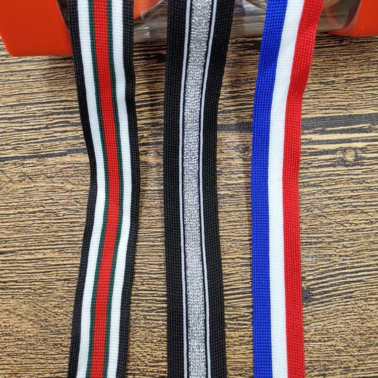 Factory direct supply spot polyester knitted ribbon 2.5cm red, white and blue ribbon high quality clothing accessories decorative edge wholesale