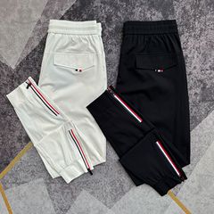 春夏速乾カジュアルパンツ男性高品質ズボンファスナー純色束足衛ズボン
