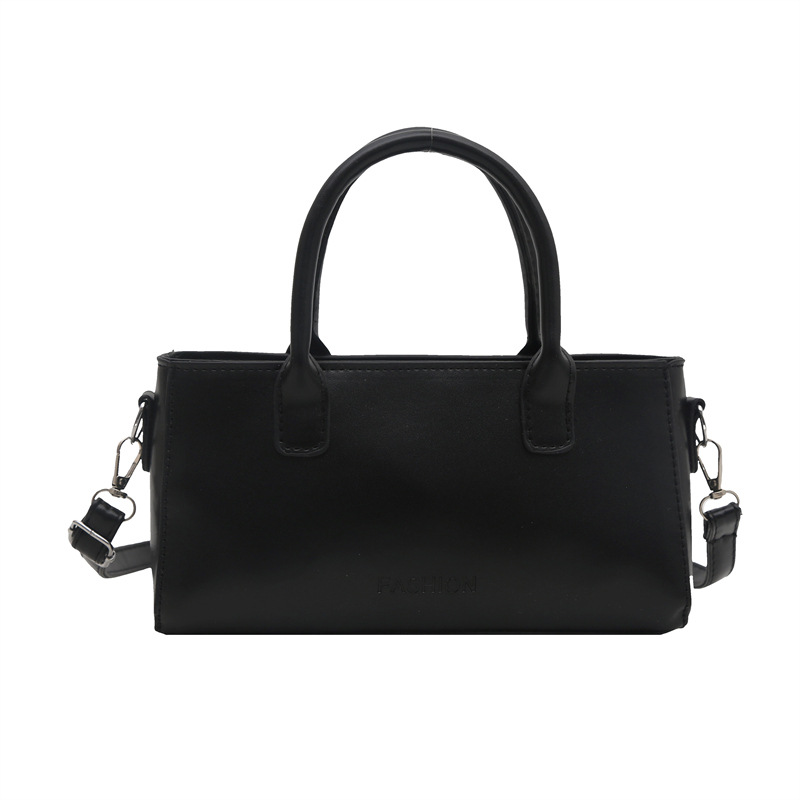 Bolso cuadrado pequeño simple de mano 2025 primavera y verano nuevo estilo bolso de hombro de moda de alta gama versión coreana bolso de mensajero de nicho femenino