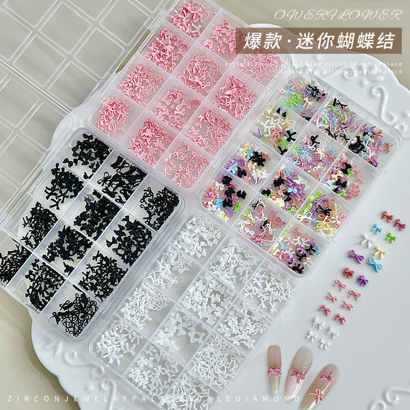 12 cuadros mini bowknot accesorios de uñas tamaño mixto estilo explosivo transfronterizo blanco y negro pajarita rosa accesorios de diamantes de uñas
