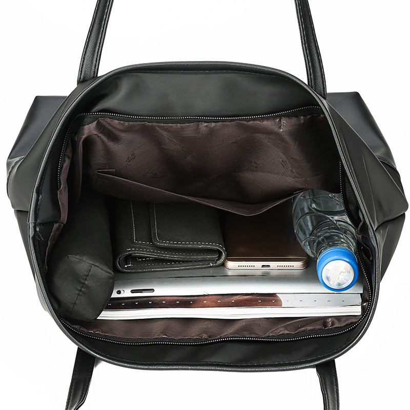 Nuevo bolso de mujer transfronterizo tote 2025 versión coreana de bolso de hombro de gran capacidad Oxford Clothing Split soft Pocket