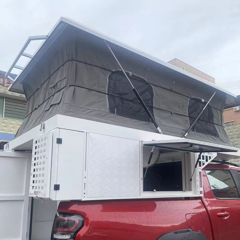 La camioneta de camada blanca se puede elevar y bajar la caja de la casa de carga, la camioneta se puede desmontar y montar de manera flexible y conveniente.