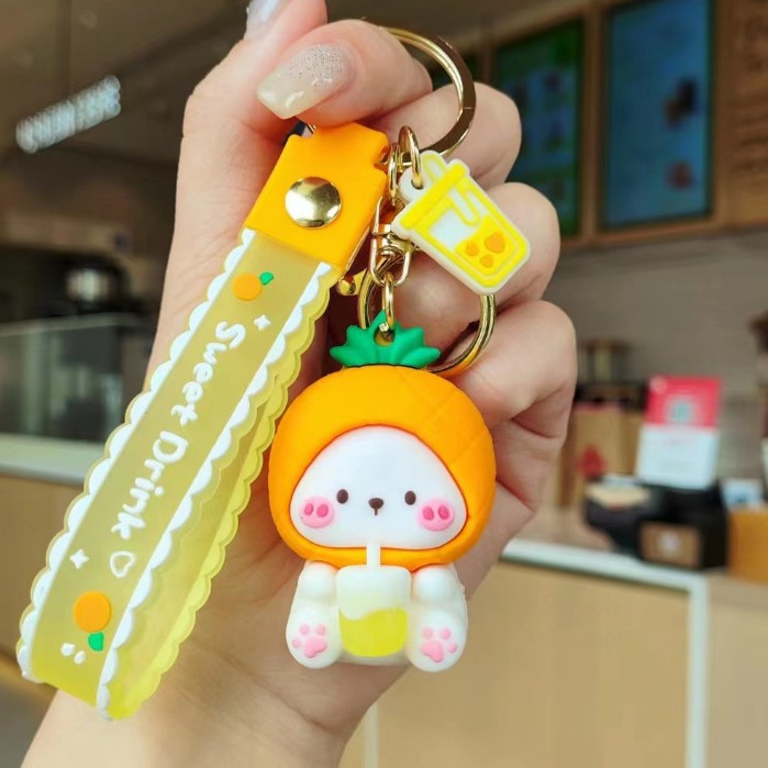 Muñeca de dibujos animados goteo llavero bolsas escolares exquisitas para hombres y mujeres colgantes para agarrar muñecas colgantes para el mercado nocturno regalos al por mayor