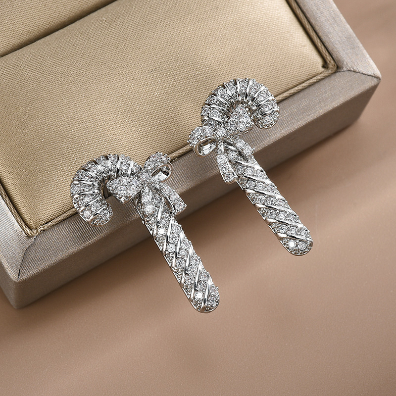 S925 Silber Nadel Japanische und Koreanische Mode Ohrringe Kupfer Micro intarsien Zirkon Fee Stick Schmetterling Knoten Ohrringe Einfache und Vielseitige Ohrringe f_voghion.com