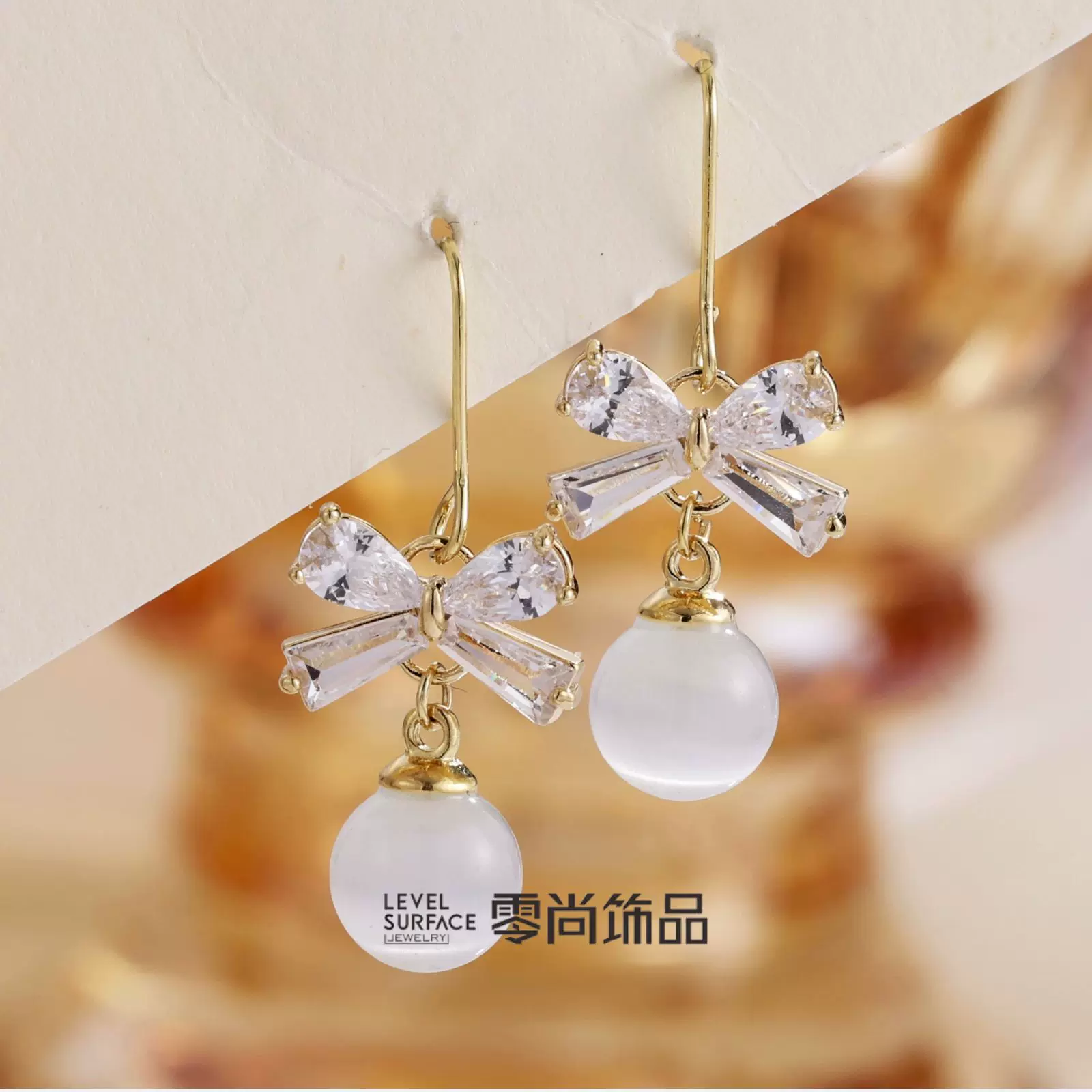 零尚蝴蝶结锆石耳钩女时尚百搭典雅闪亮猫眼石女生礼物耳饰直销