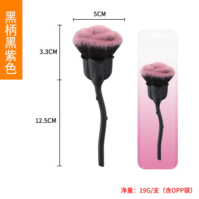 バラのばらの粉の化粧ブラシの化粧道具の爪の粉のほこりは頬紅のブラシを塗って化粧道具の現物を修理します。|undefined