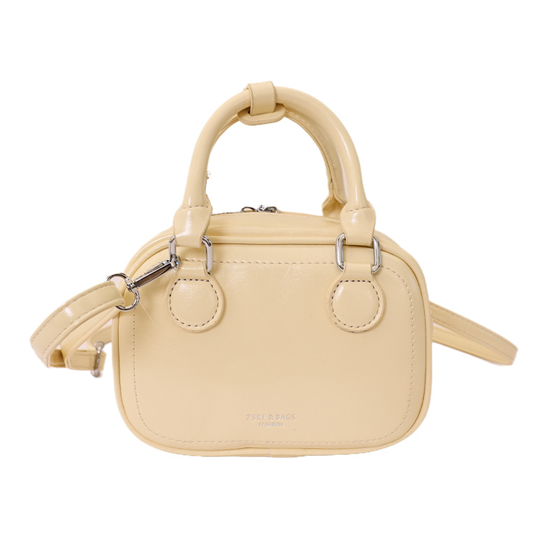 Bolsa de bolos portátil de alto nivel para mujeres 2026 nueva moda coreana lujosa y ligera bolsa de hombro