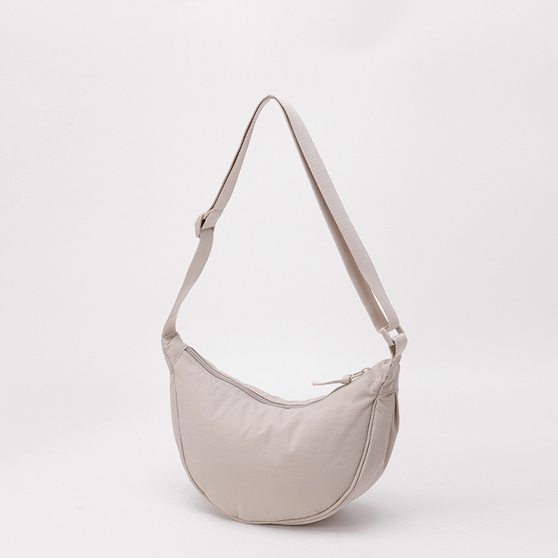 Bolso de tela pequeño bolso de moda ligero bolso de mochila de nylon transfronterizo mujer bolso de hombro casual versátil bolso de bolsas de bolsas de bollo de gran capacidad