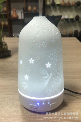 源头厂家直辖陶瓷外罩旋转镂空细腻喷雾香薰机加湿器精美礼品