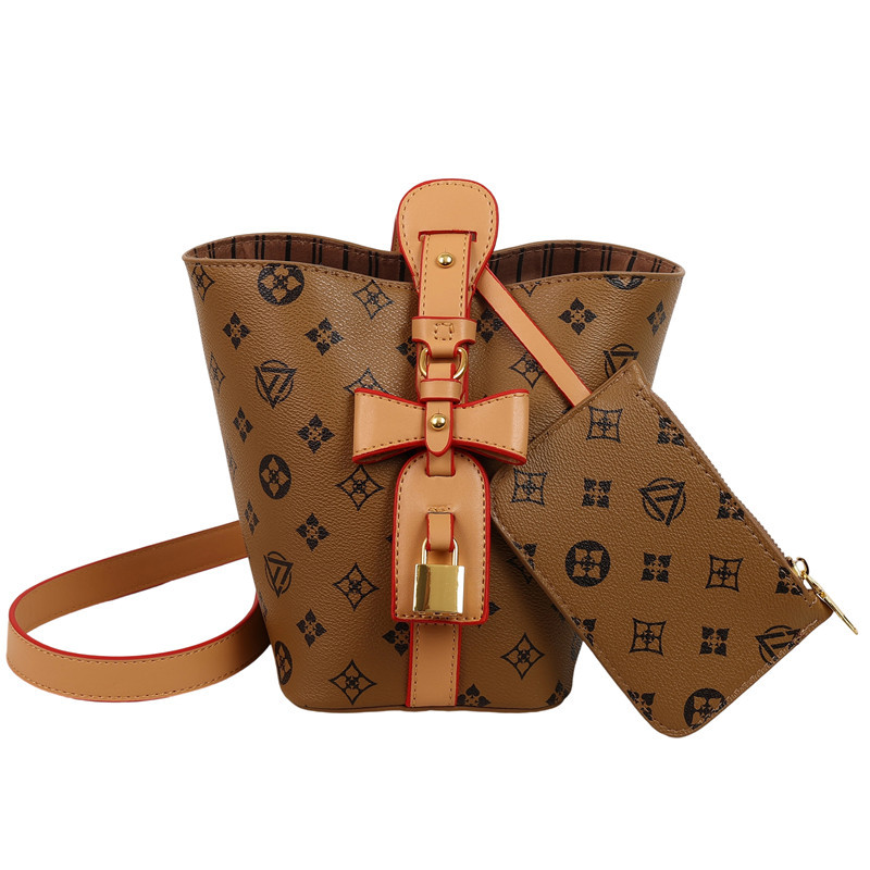 Bolso de cubo retro estilo Hong Kong 2025 verano nuevo bolso femenino personalidad bowknot bandolera moda contraste color bandolera