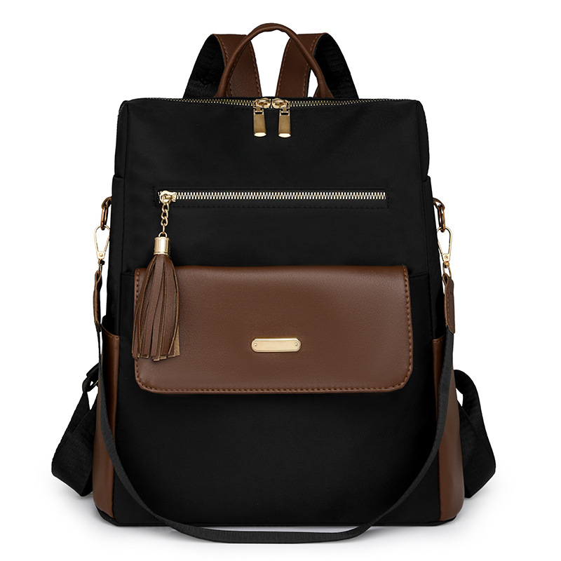 Mochila de tela de nailon nueva transfronteriza para mujer, bolso de viaje de ocio ligero y versátil de gran capacidad, mochila con flecos