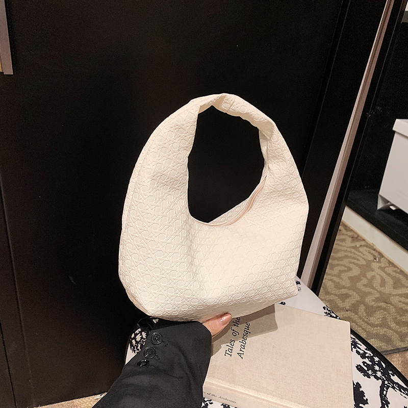 Bolsa de viaje de moda simple dulce2024 invierno nueva personalidad temperamento casual de gran capacidad bolso de media luna portátil