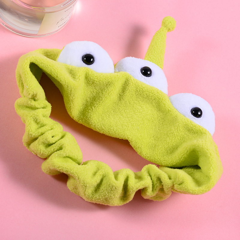 Tres ojos monstruo pelo banda femenina accesorios para el cabello lavado de la cara banda de pelo artefacto venta al por mayor Peluche de ala ancha dibujos animados Otoño e Invierno
