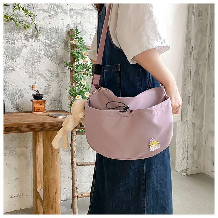 The new 2022 Little Bear canvas small bag for women is simple and versatile. The student dumpling bag is a trendy casual single-shoulder crossbody bag undefined
